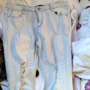 Distressed blue jeans